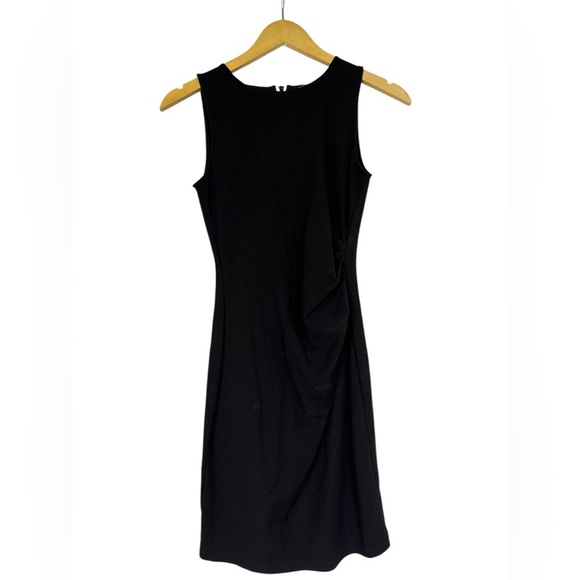 Unique LBD‎ (size 2) with rear white zipper that zips up and down. - Picture 1 of 3